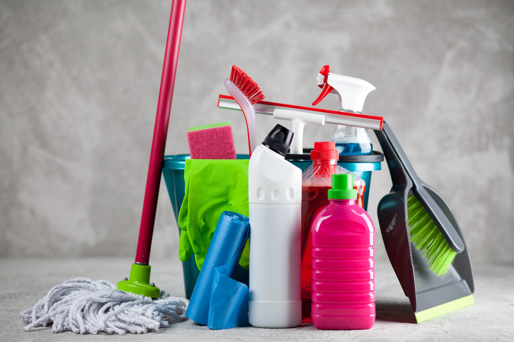 Cleaning Supplies on Grey Background